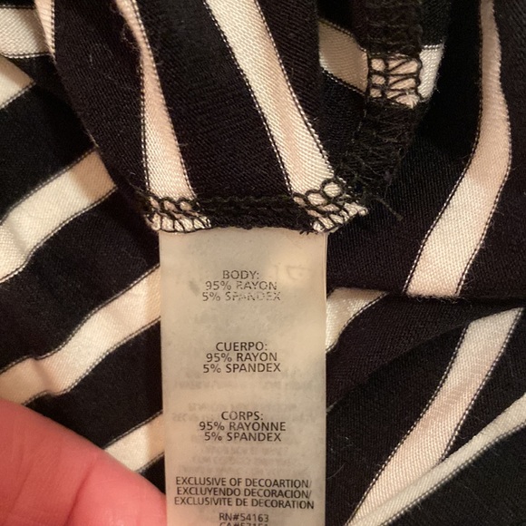 Calvin Klein black and white striped “ cold shoulder” dress on size M. - Picture 7 of 8